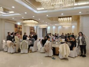 New year celebration at YISWIM. The employees are having fun at the dinner party